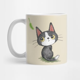 Black kitten and cat toy Mug